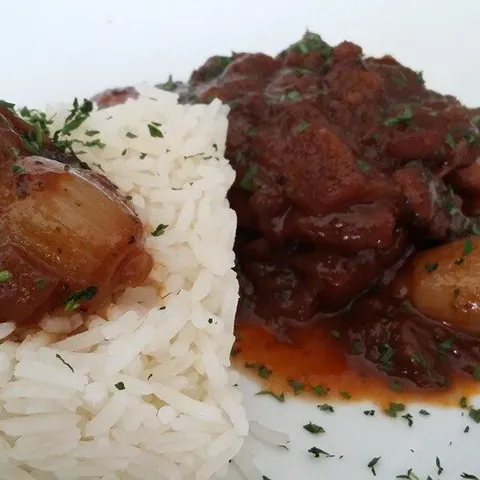 Slow-cooked meat with rice