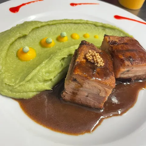 Pork fillet with pea purée