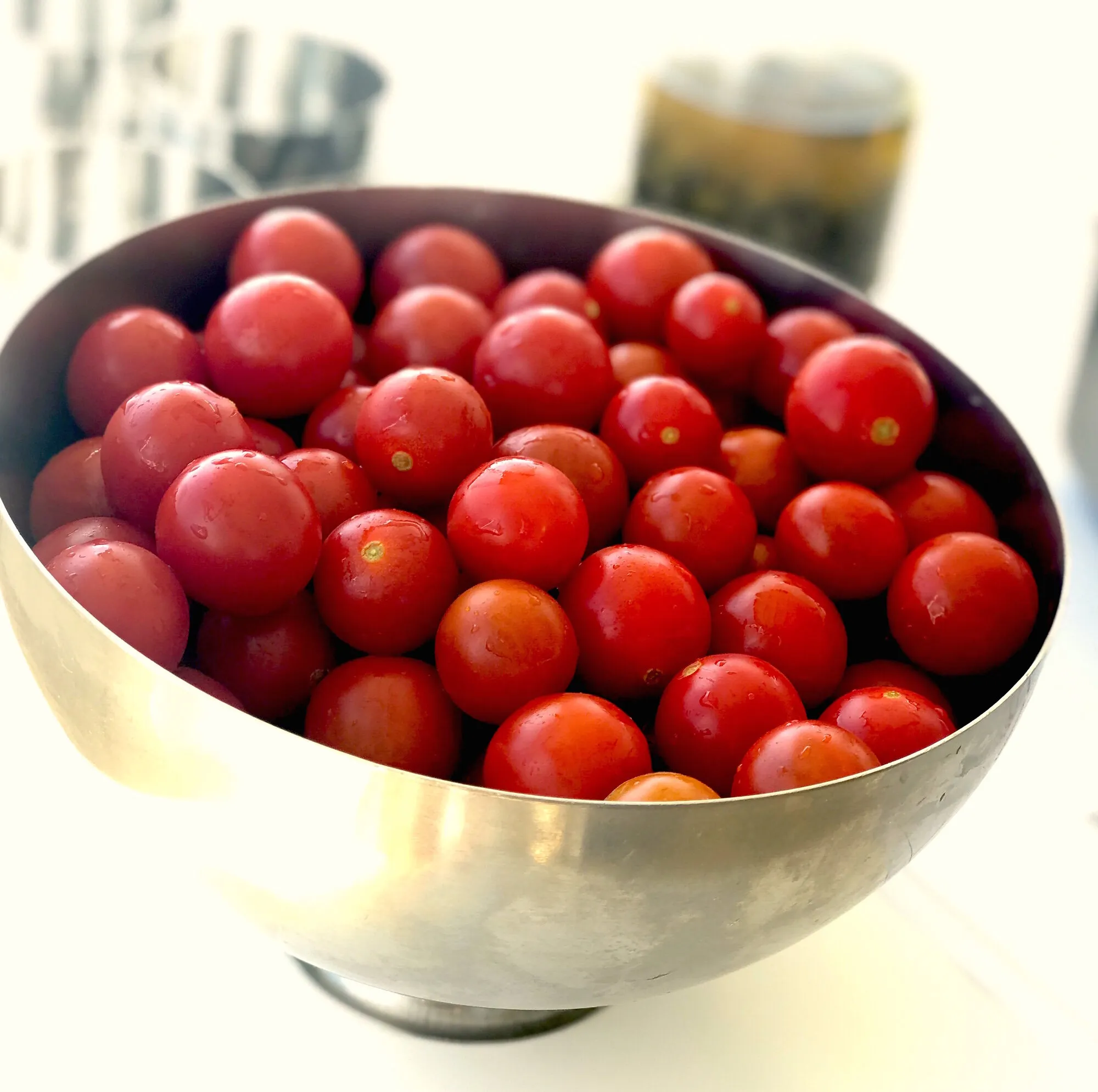 A bowl of small Santorini cherry tomatoes